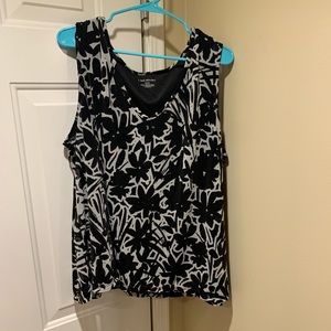 Sleeveless black and white shirt